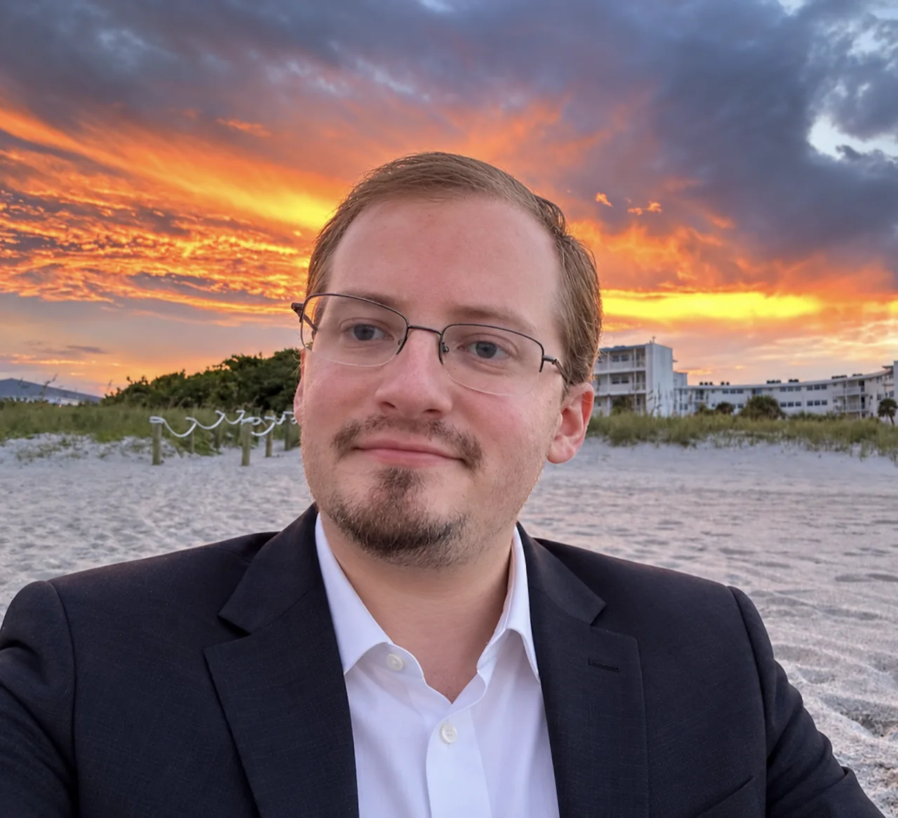 Neil Fox at the beach at sunset